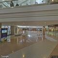 Person experiencing chest pain at Denver airport exchange