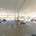 Property damage crash at gas station on Main Street
