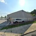 Truck hits building and leaves scene on Chester Place