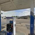 Disabled occupied vehicle at Marathon gas station