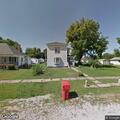 Illegal burn at vacant house on West Church
