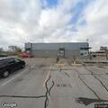 Driver arrested after curb-jump at Englewood lot