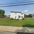 Unknown man throws object at window, argues outside home