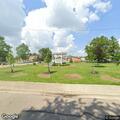 Confused man knocking on doors near Seger Park