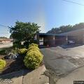 Person lying in fetal position at car wash in Uniontown
