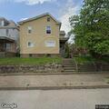 Loose aggressive dog reported on Connellsville Street