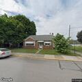 Person experiencing chest pain at East Maple Street