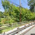 Man trespassing on train tracks at station