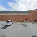 Person experiencing chest pain at pharmacy in Springfield