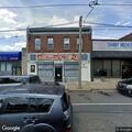Running car stolen from store on Main Street