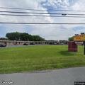 Person with headache at travel inn in St. Thomas