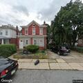 Car blocking driveway on East Washington Avenue