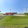 Unresponsive man in car at Dollar General parking lot