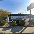 Burglar alarm sounding at auto body shop