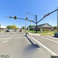 Person jumping in and out of traffic on Main Street