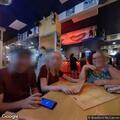 Verbal dispute among group near boardwalk business