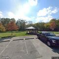 Person stumbling in roadway on Alum Creek Drive