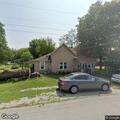 Person experiencing back pain at Ingalls address
