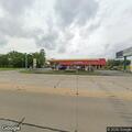 Elderly man shaking outside gas station in New Castle