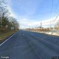 Car hits pole on Route 38, driver has breathing trouble