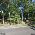 Downed house service wire over roadway