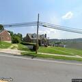 Branch fire on power lines behind Poplar Street home