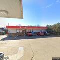 Man pours alcohol into cup at Circle K, drives off
