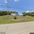 Vehicle hits guardrail on National Pike in roadway