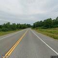 Motorcycle crash with injured rider on Main Road