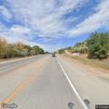 Abandoned vehicle on Highway 18 shoulder