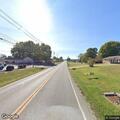 Female traveler lying in ditch on Bardstown Road