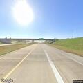 Person stopping cars on Highway 13 near exit 24