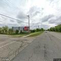 Person experiencing abdominal pain near Albion Ave
