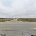 Broken utility pole with low-hanging wires on IL 115