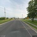 Traffic stop on white 2013 Ford utility