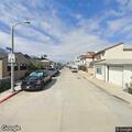 Patient sitting on curb at 39th and Bellevue in Newport Beach