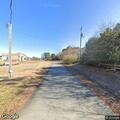 Light smoke from utility pole on Raleigh Street