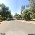 Vehicle and dirt bike collide on Carlie Drive