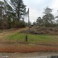 Tree debris blocks lane on East Gantt Mill Road