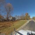 Traffic stop on silver Cadillac with expired plate