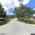 Resident complains about idling tree trimming truck