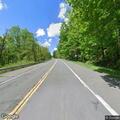 Motorcycles and cars racing near Little Long Pond