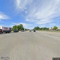 Unoccupied disabled SUV blocking intersection