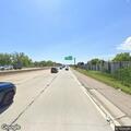 Dog loose in highway construction median