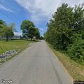 Vehicle runs stop sign near school bus