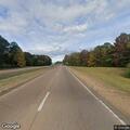 Stopped truck blocking highway lane near Oxford