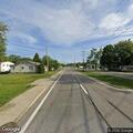 Officer questions female suspect at Hebron Road