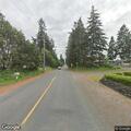 Person reported walking through woods toward homes