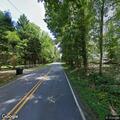 Minivan hits light pole on Earlysville Road