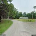 Wire down in roadway and driveway on Golf Drive